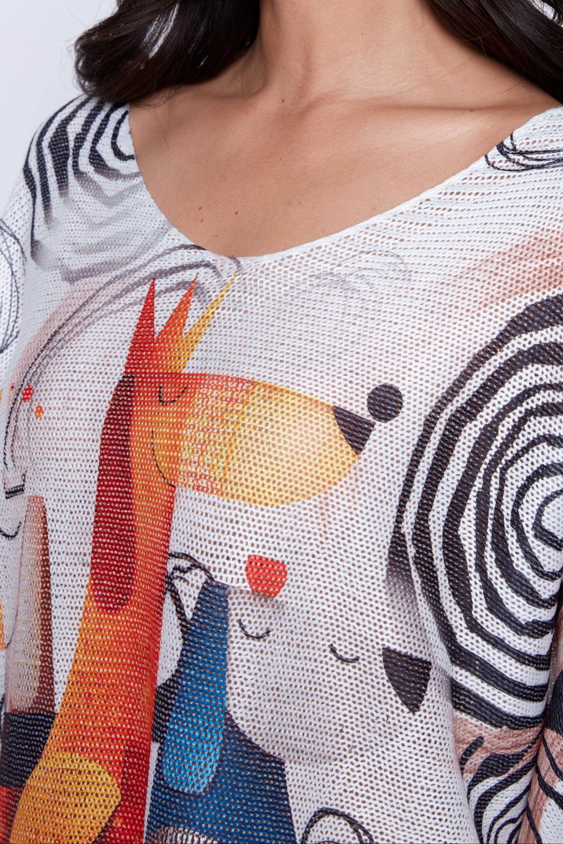 Le pull à imprimés de chiots