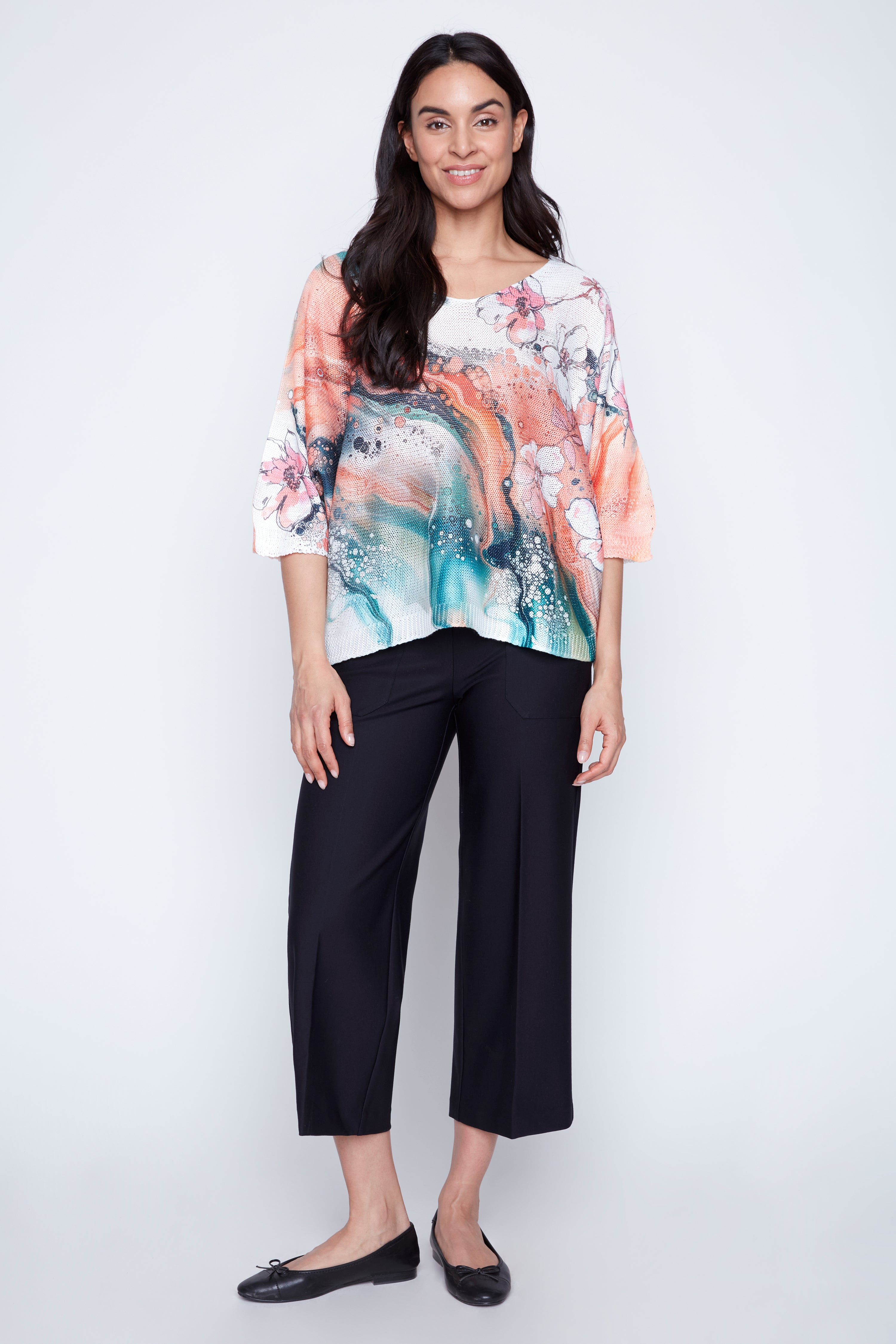 Le pull à imprimé marbré floral