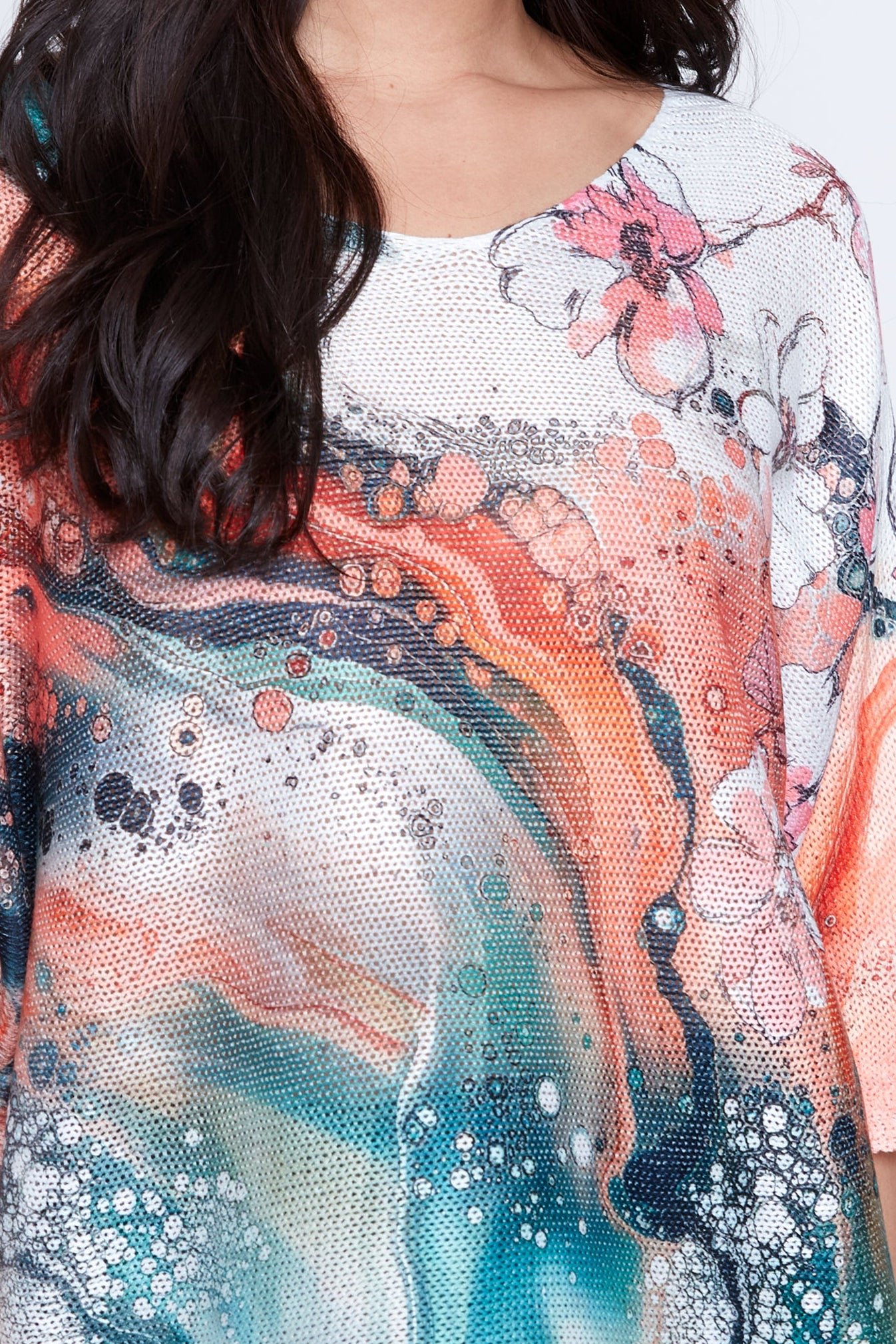 Le pull à imprimé marbré floral