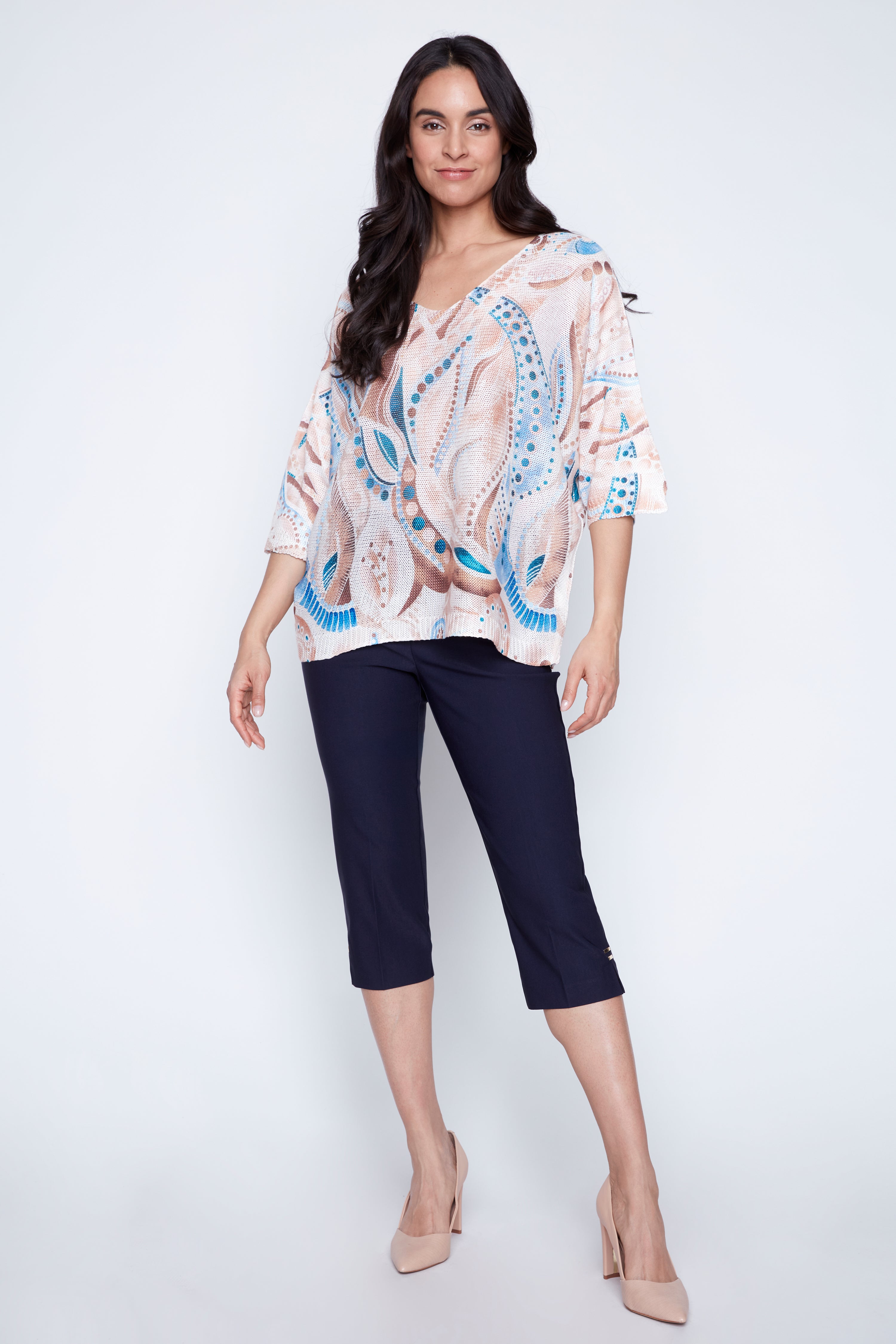 Le pull à motifs pois abstraits