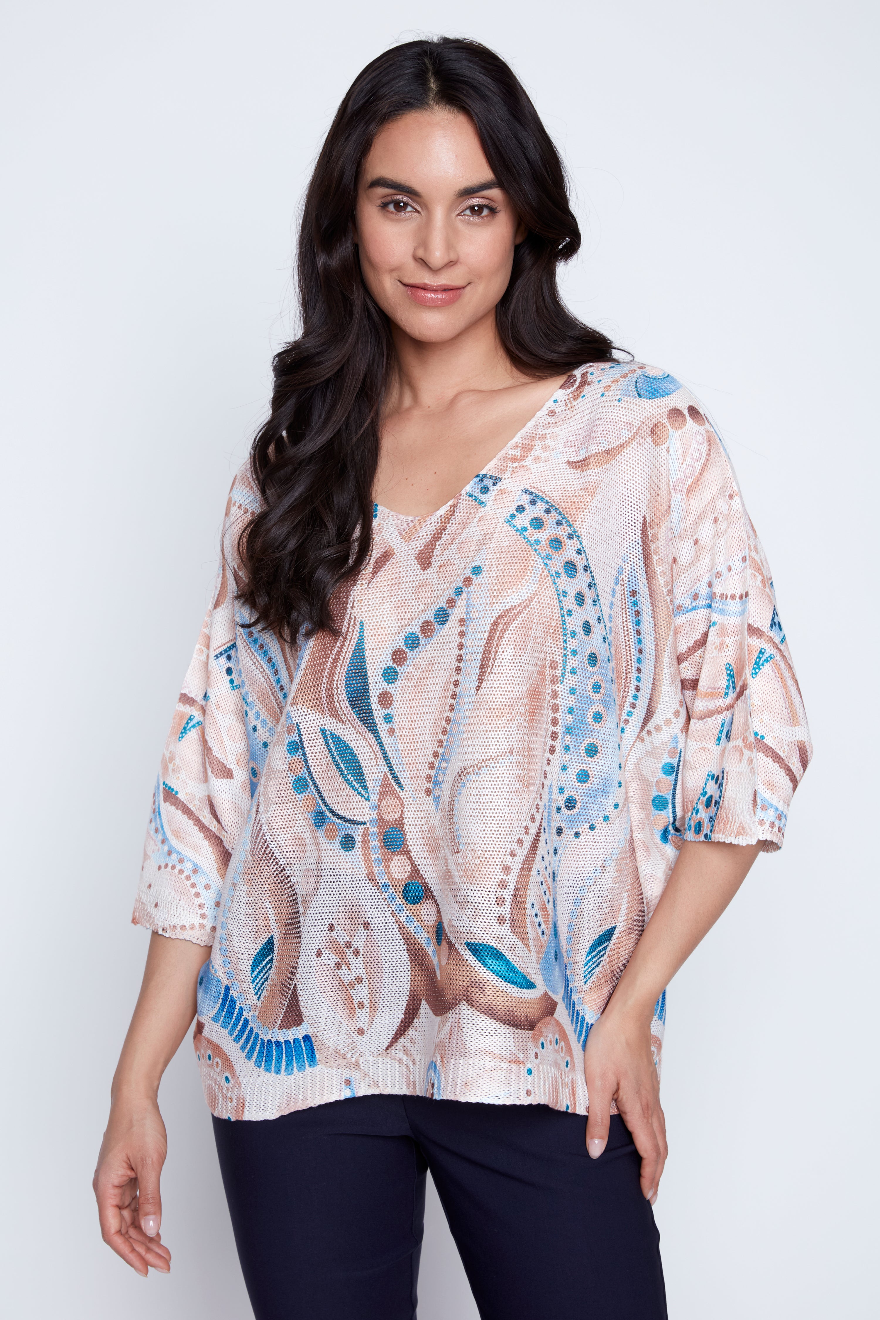 Le pull à motifs pois abstraits