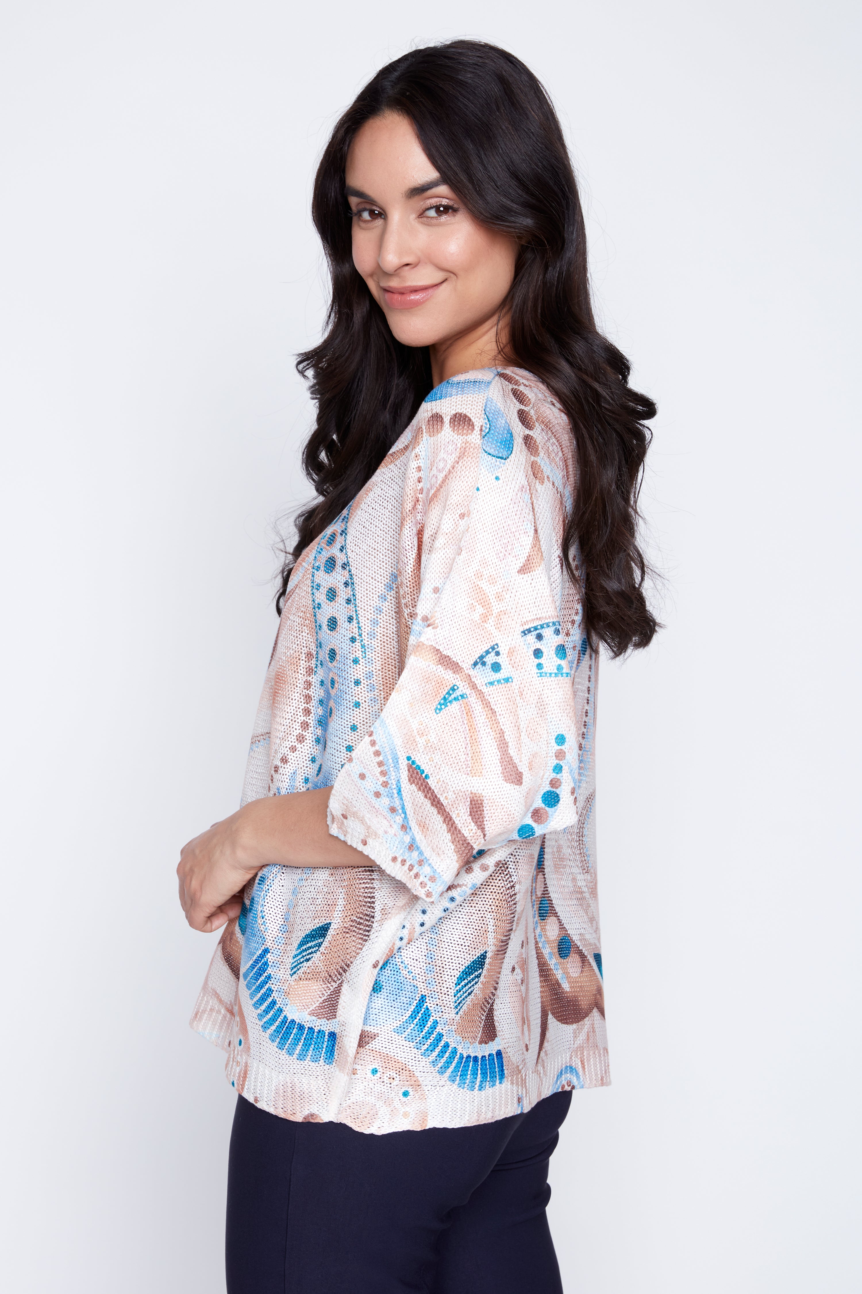 Le pull à motifs pois abstraits