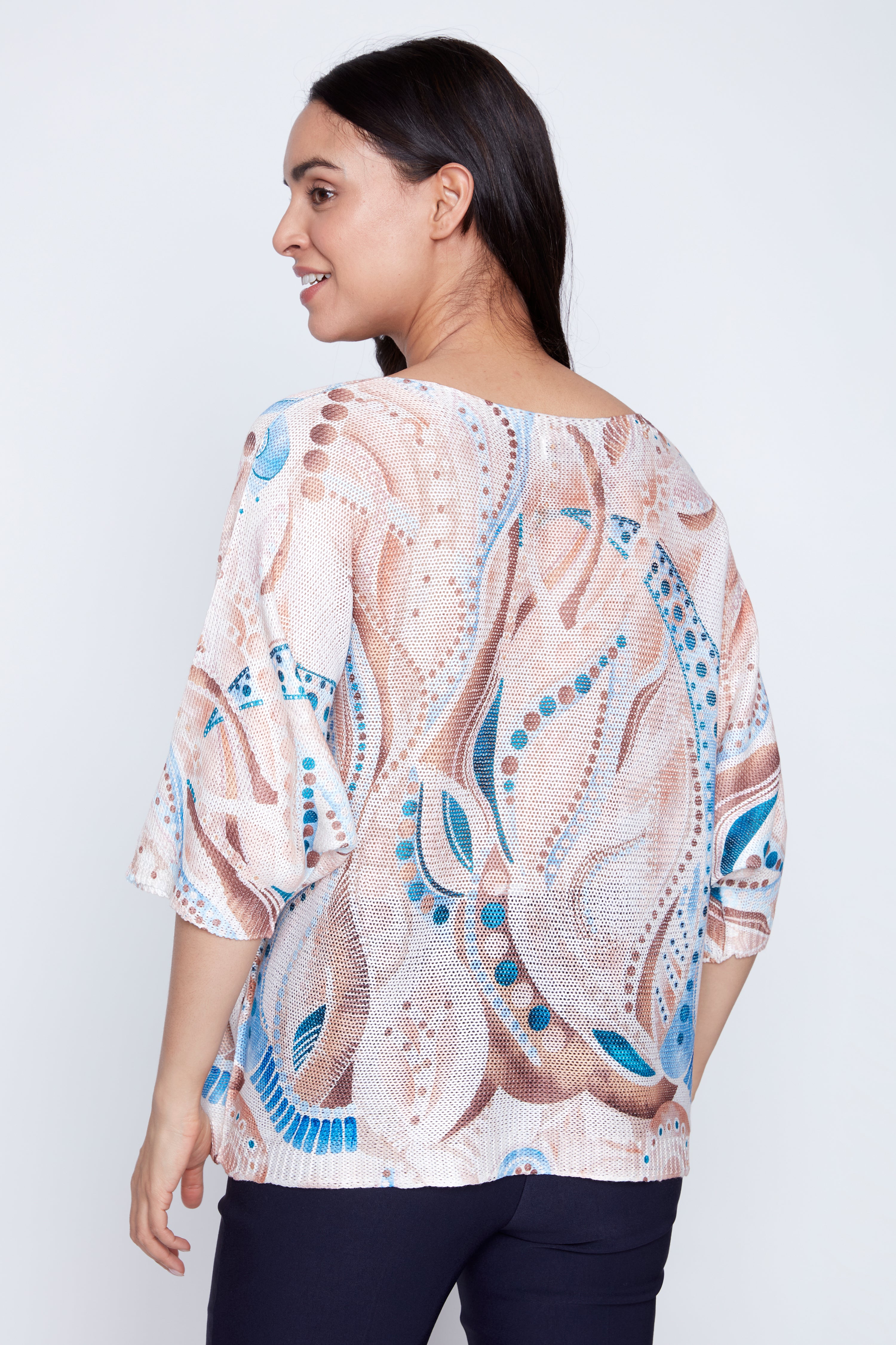 Le pull à motifs pois abstraits