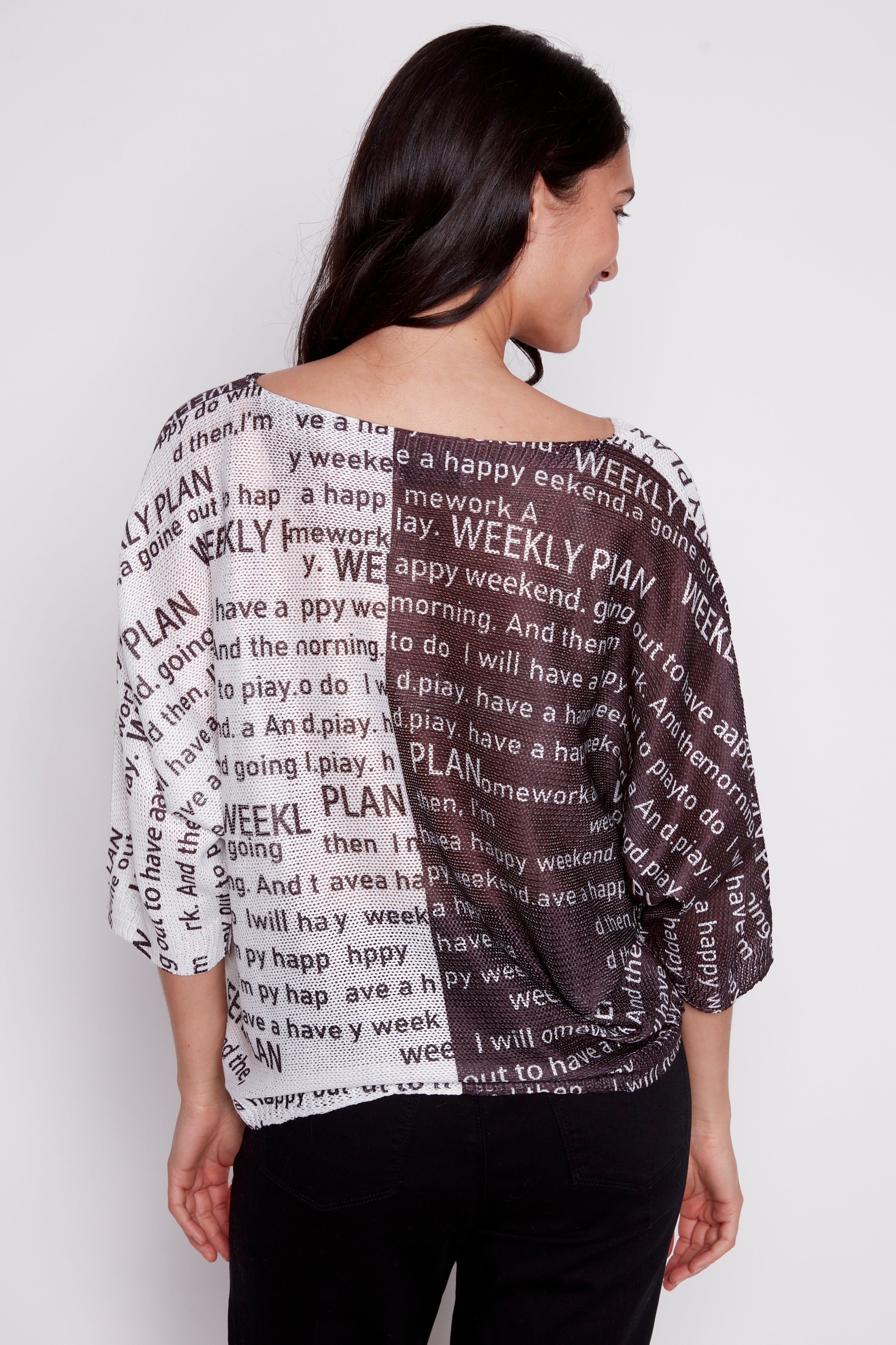 Newspaper print knit sweater