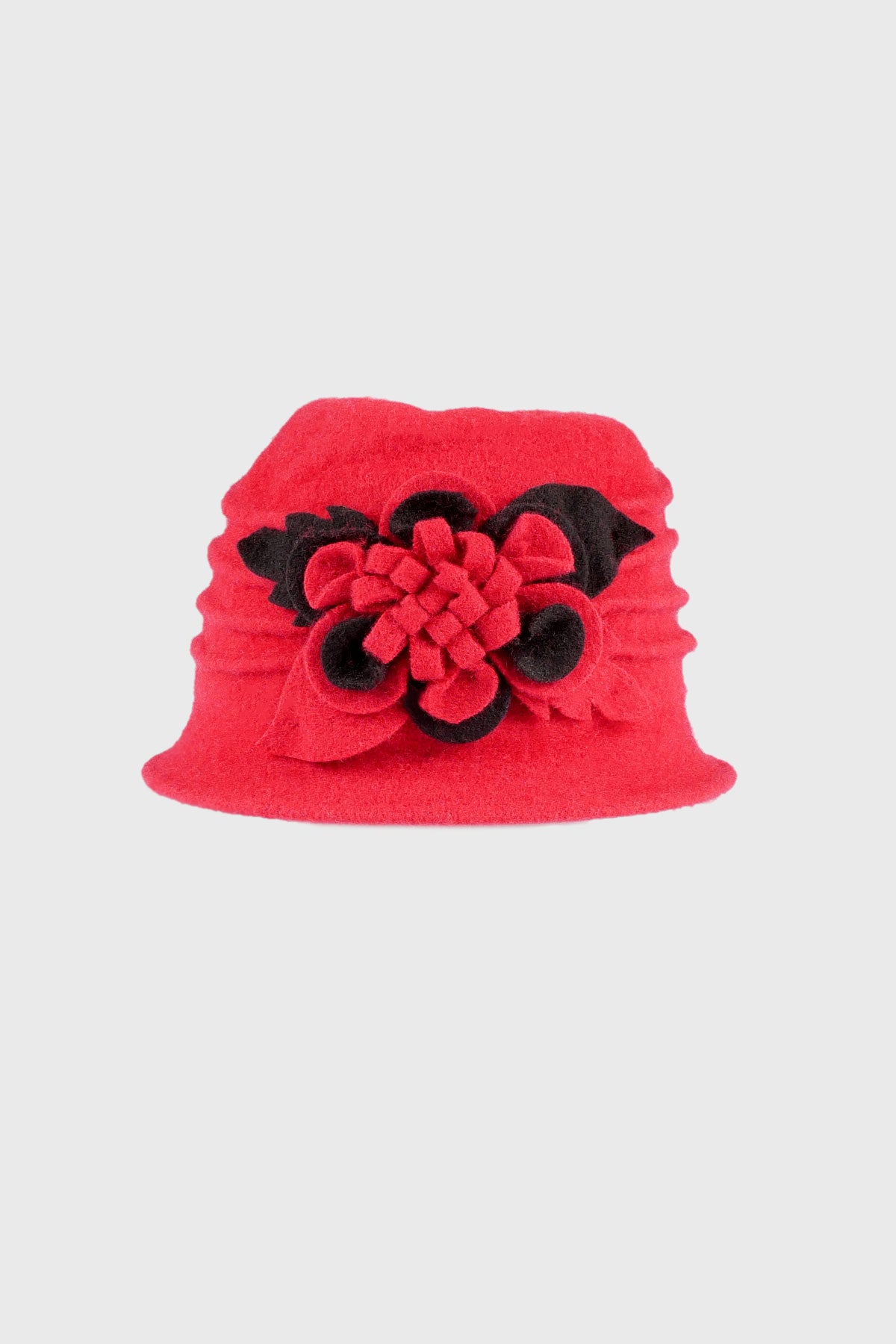 Le chapeau en laine bouillie à plis et fleur bicolore