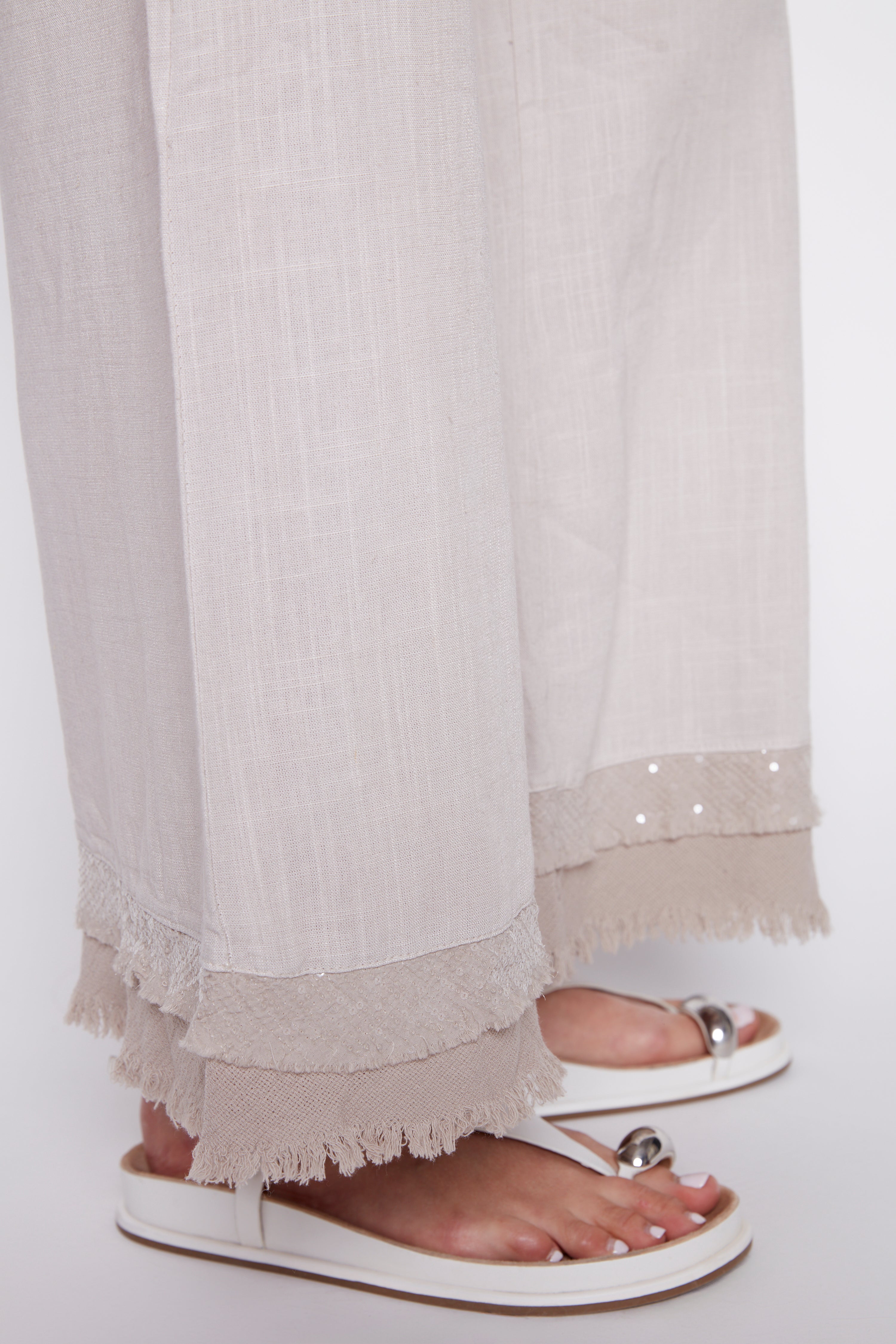 Palazzo pant with sequin and fringe hem